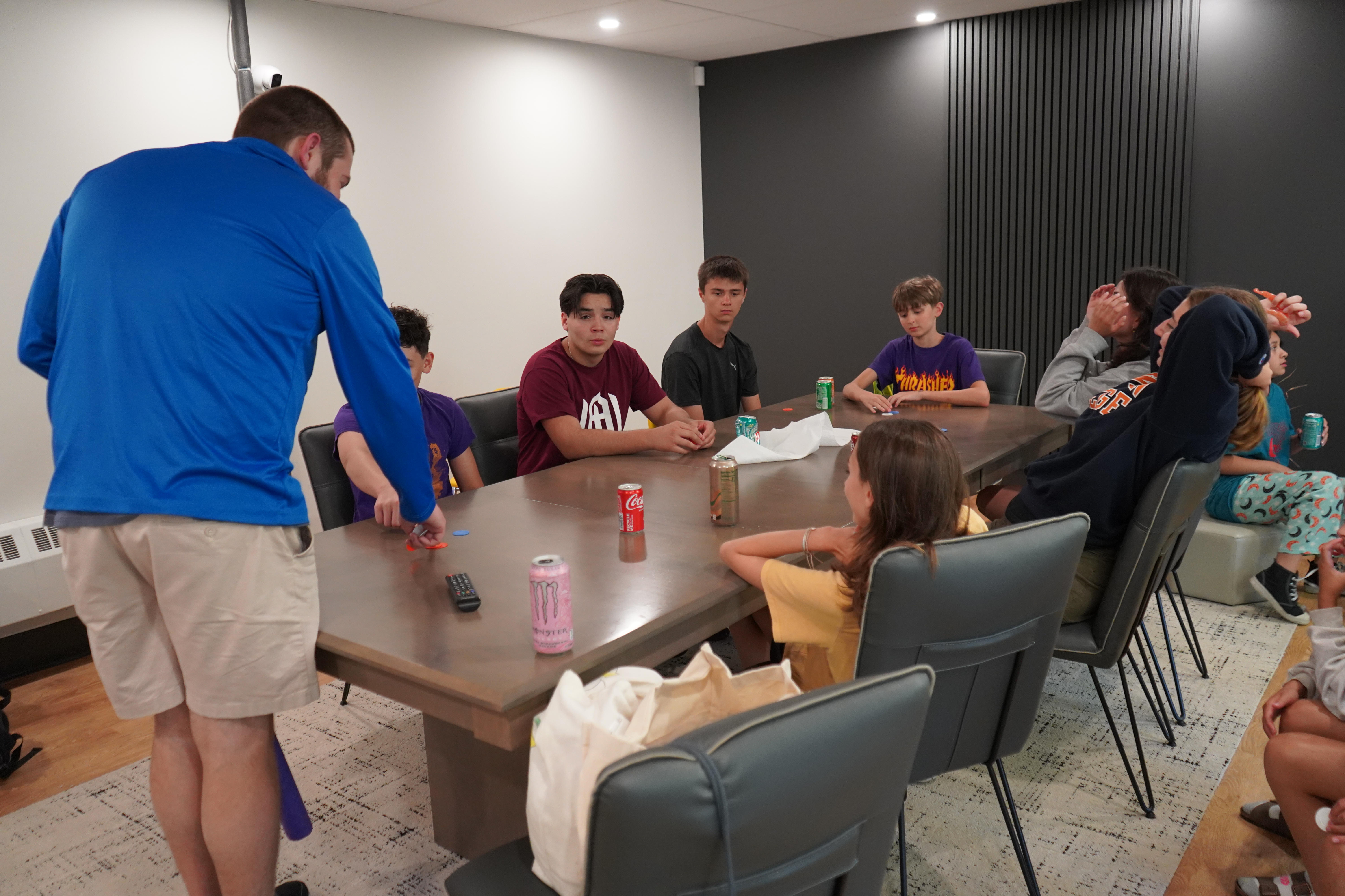 Youth group students around a table